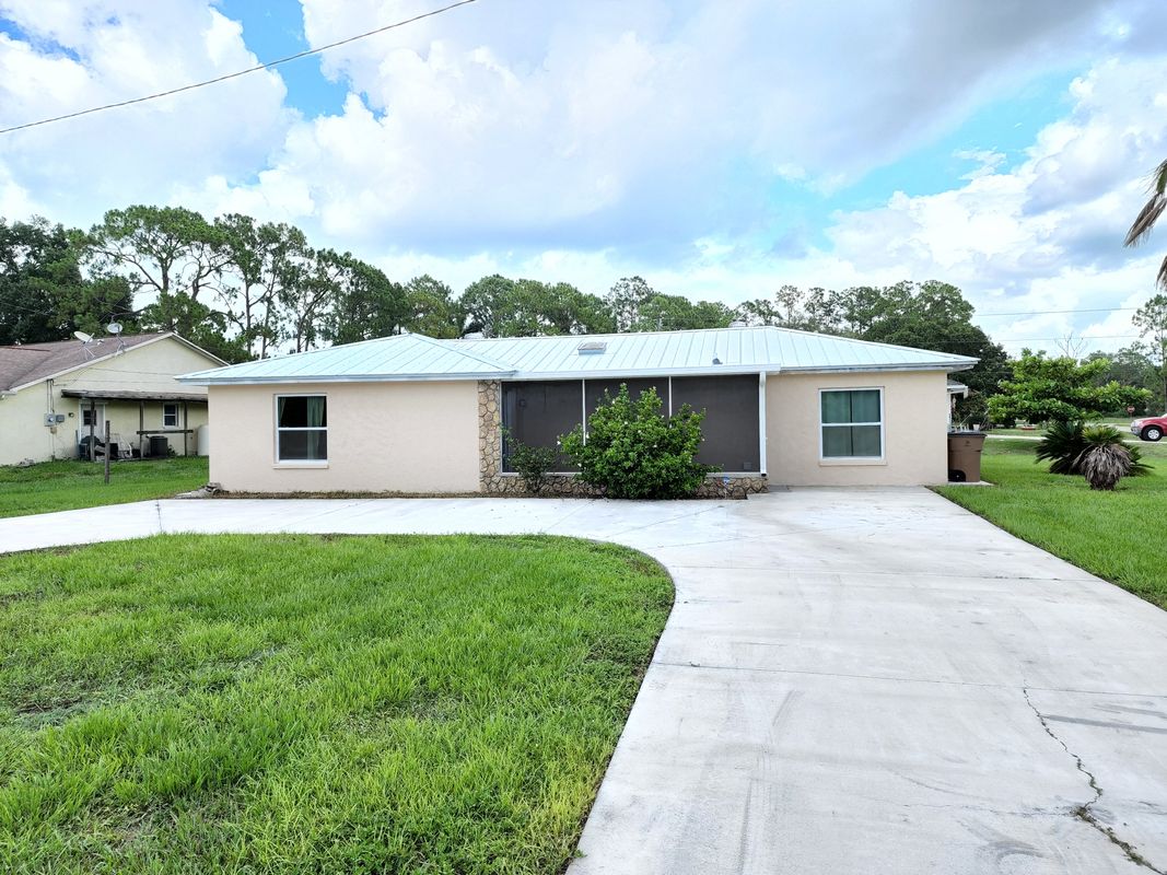 100 Roosevelt Ave, Lehigh Acres, FL 33936